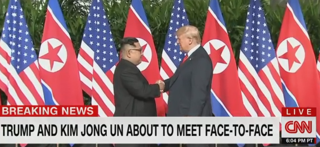 罕见!金正恩特朗普握手照传遍全球 美朝峰会中这一货币\"惊魂未