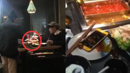 情侣火锅店吵架 女生抢男友手机扔进火锅