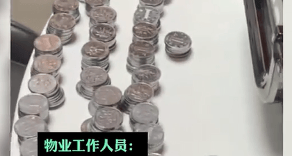 女子用6100个硬币交物业费